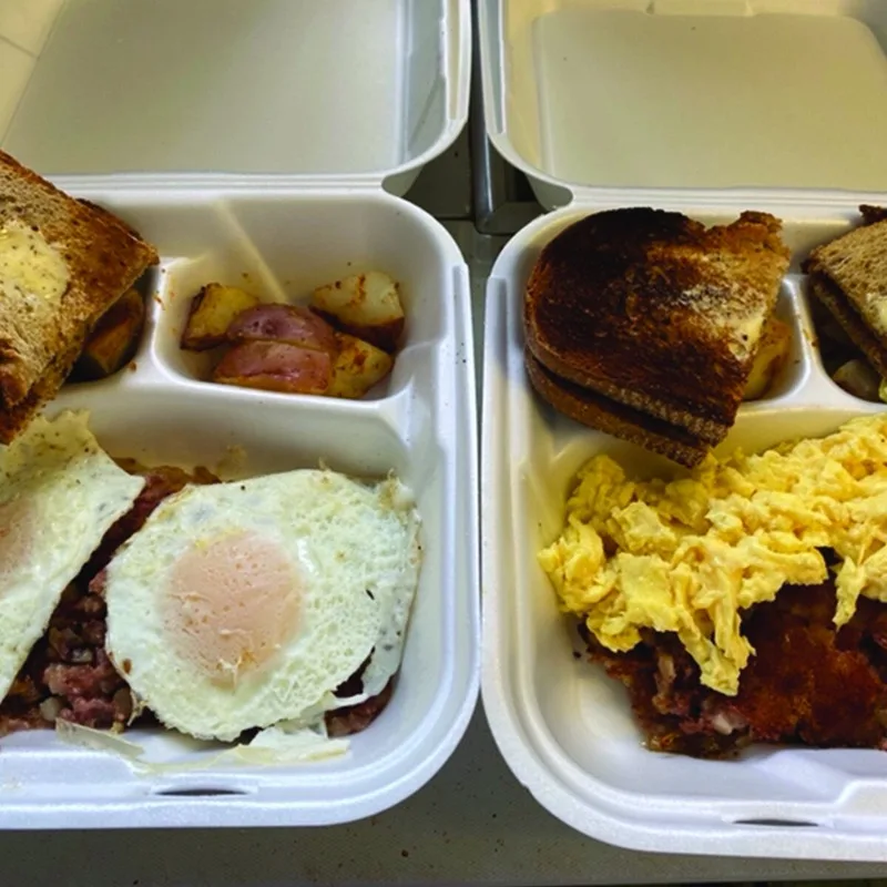 Breakfast plates with eggs, homefries, and toast at Picnic Box
