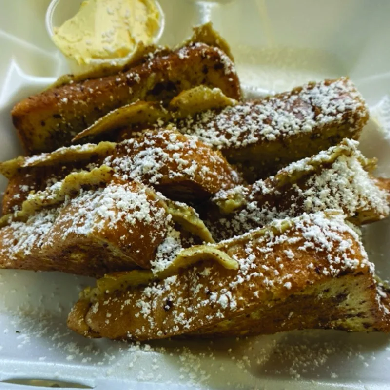 French toast sticks dusted with powdered sugar