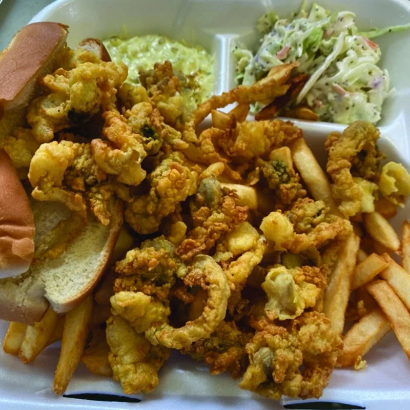 Fried clams platter with coleslaw and tartar sauce