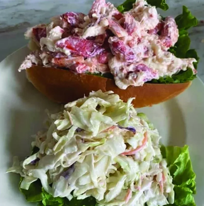 Fresh lobster roll with coleslaw